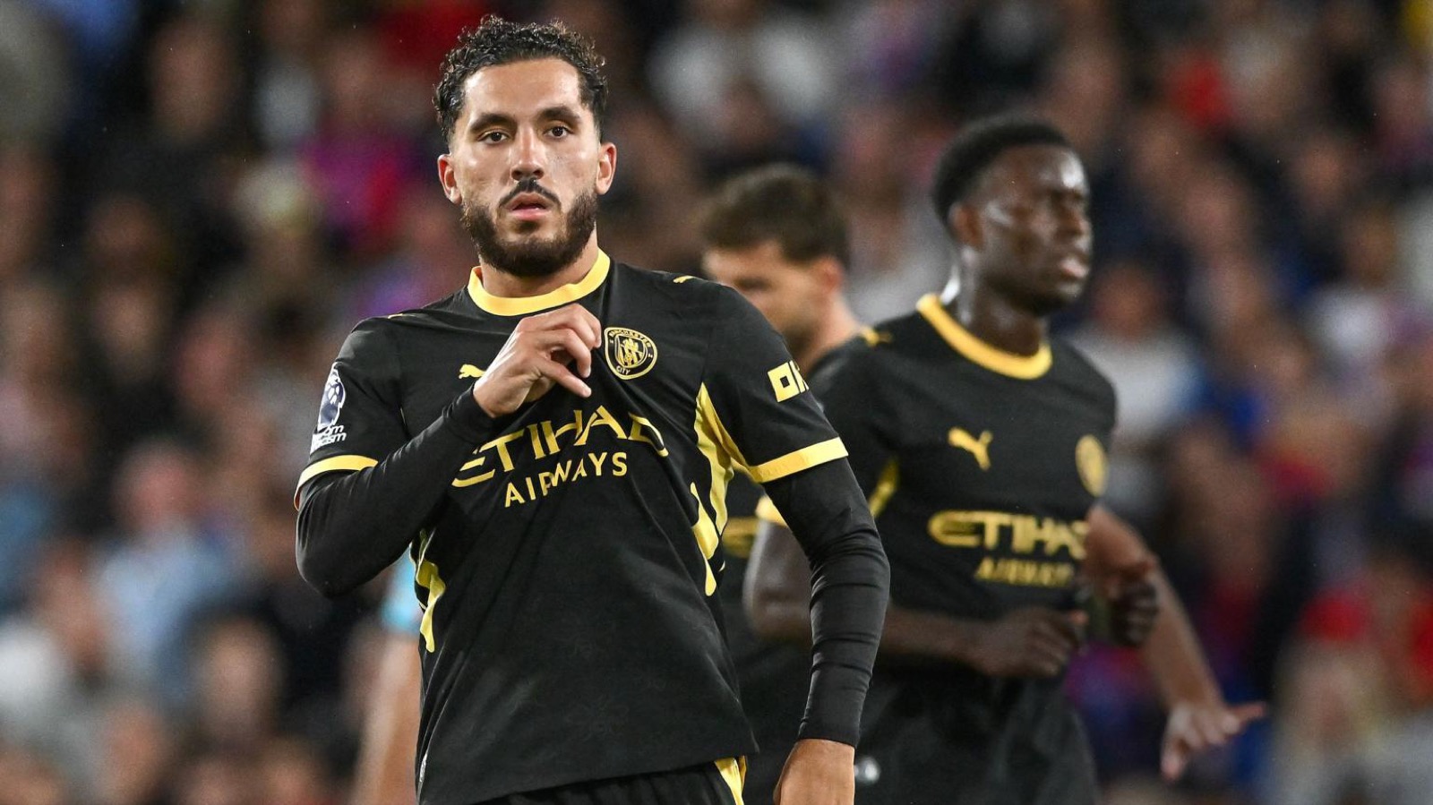 Rayan Cherki celebrates for Manchester City at Selhurst Park
