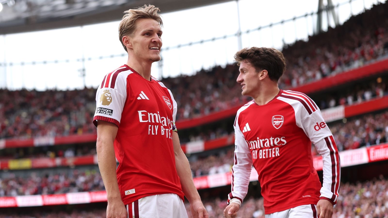 Arsenal celebrate against Chelsea at the Emirates