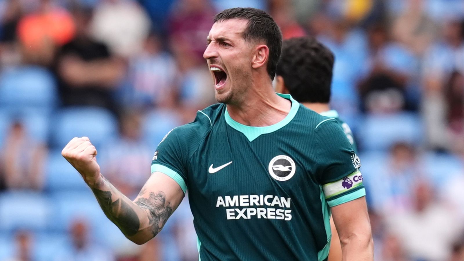 Lewis Dunk celebrates at Coventry